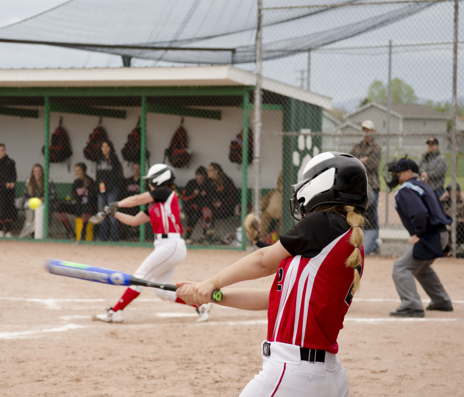 Huntley Project's Jenna Ley warms up as Sara Sumner hits